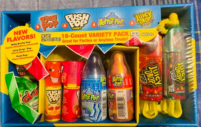 Valentine's Day gifts for kids: colorful variety pack of Ring Pop, Push Pop, Baby Bottle Pop, and Juicy Drop candies.