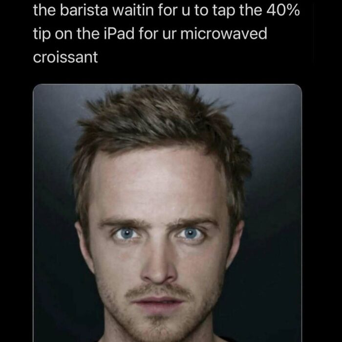 Man with a surprised expression; cooking meme text above jokes about barista tipping for a microwaved croissant.