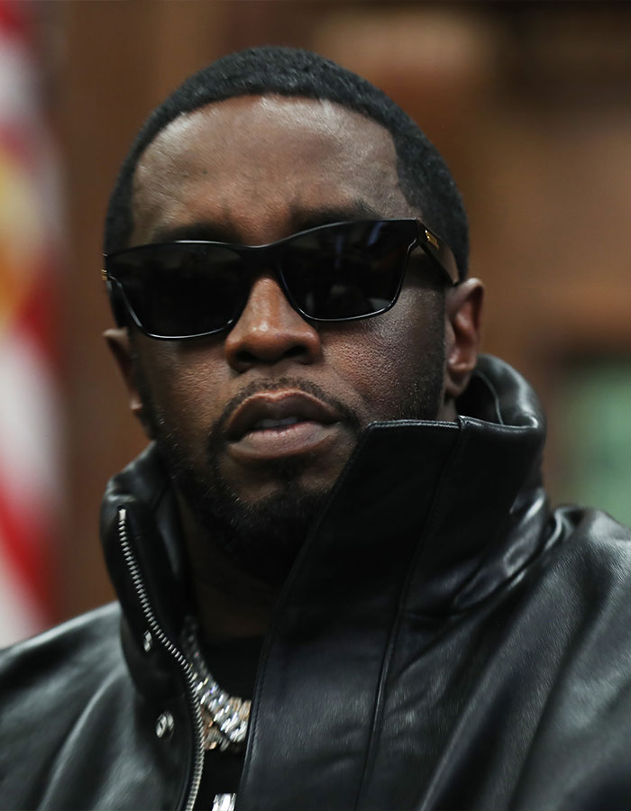 Man in a black leather jacket and sunglasses, representing a legal challenge involving Diddy's lawyer.