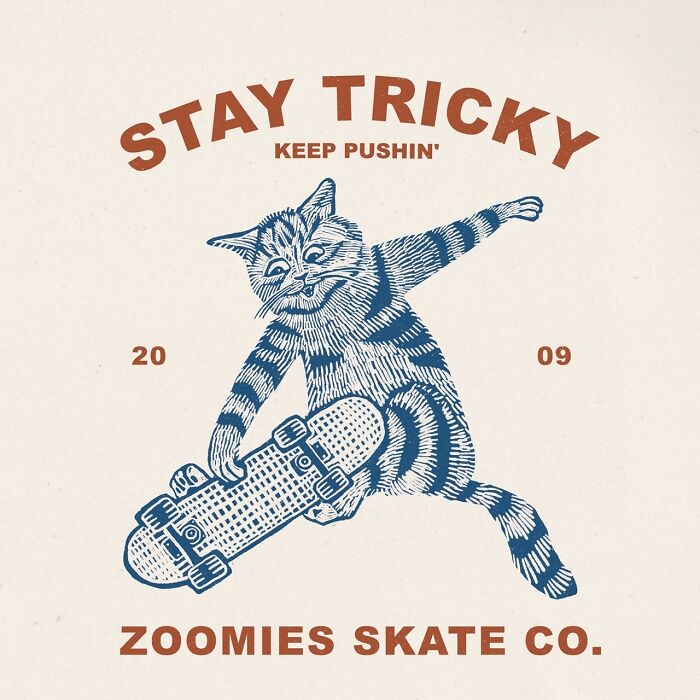 Cat performing a skateboarding trick, embodying quirky and hilarious nature, with "Stay Tricky" and "Zoomies Skate Co." text.