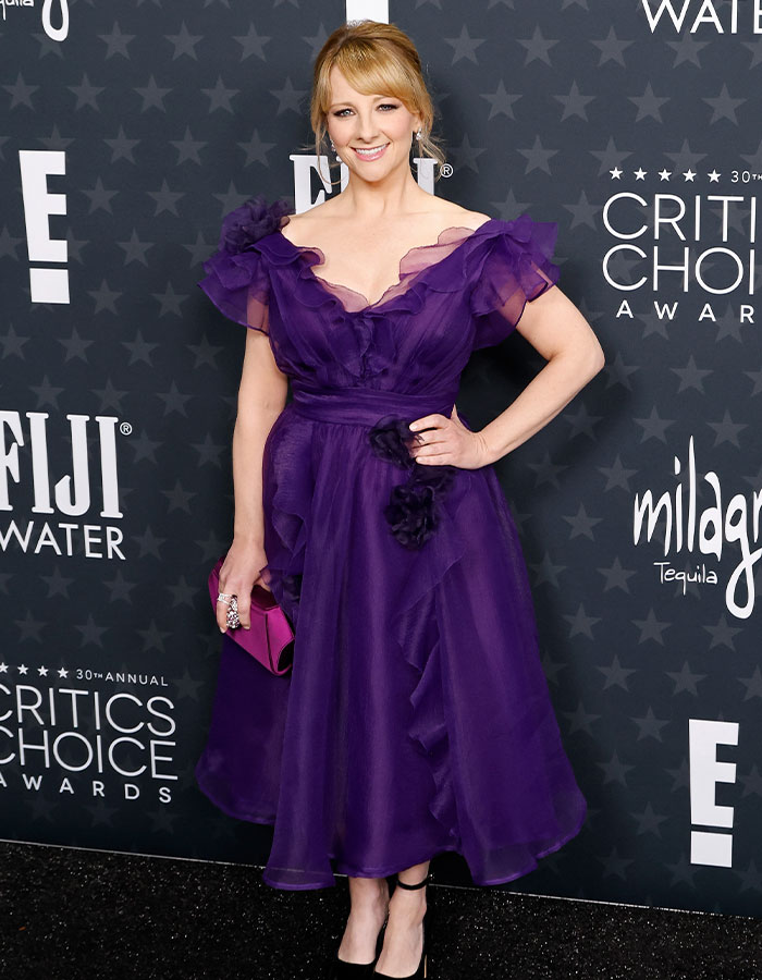 Purple daring outfit at Critics Choice Awards red carpet.