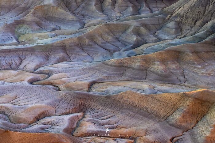 Textures of nature captured in an intimate landscape photo by Michael Hindman, showcasing eroded hills and ridges.