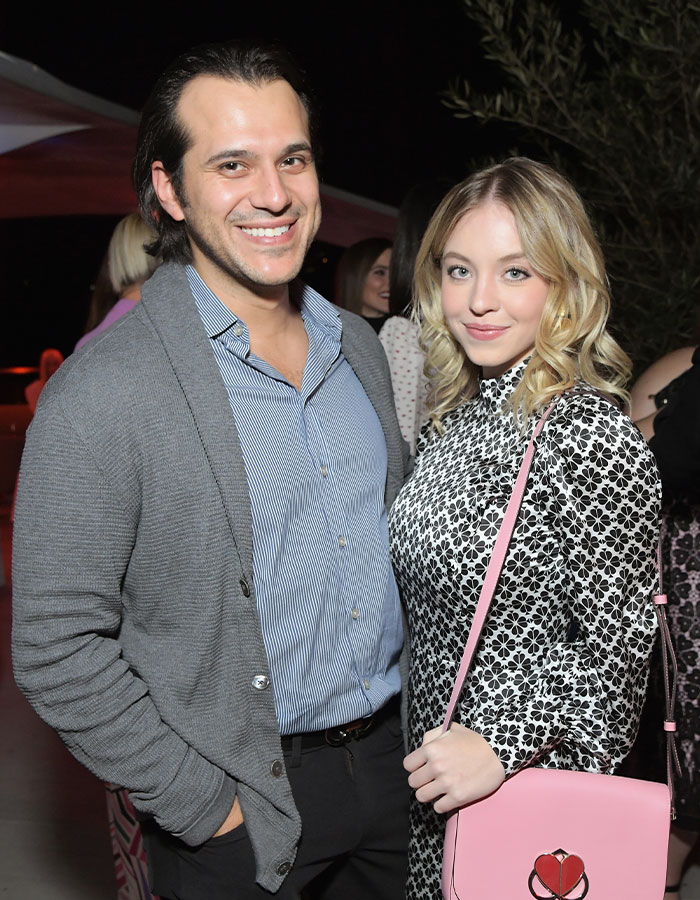 Couple smiling at an event, with keywords "Sydney Sweeney and fiancé" highlighting relationship status.