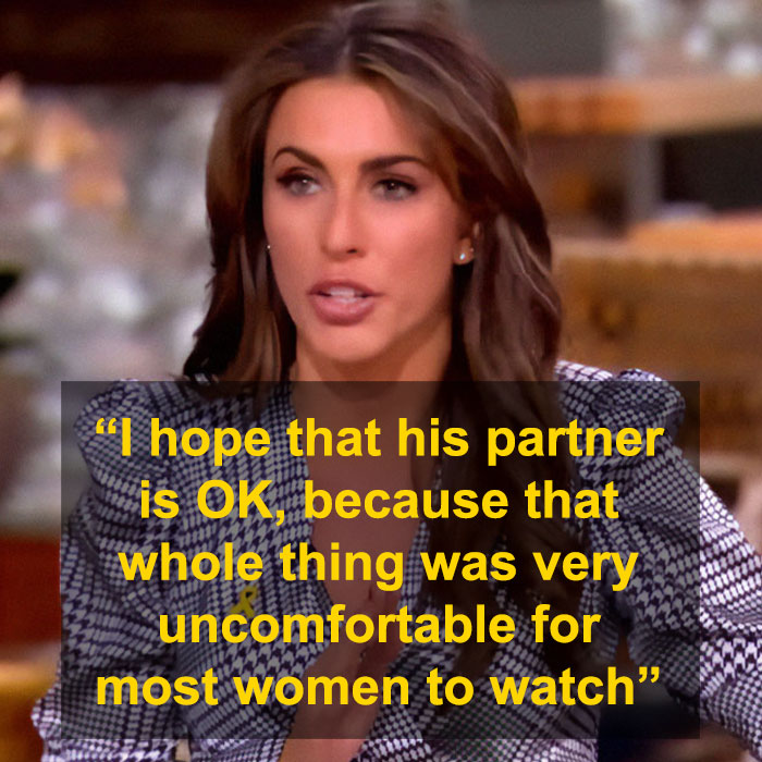 Young woman discussing Bianca Censori's controversial Grammys dress with highlighted quote, wearing a patterned outfit.