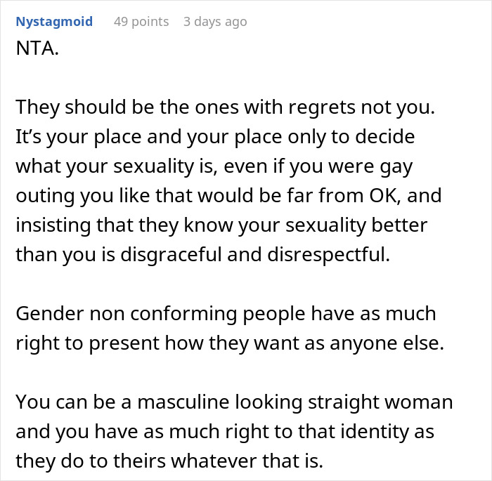 Comment discussing assumptions about a woman's sexuality based on appearance, emphasizing gender non-conformity.