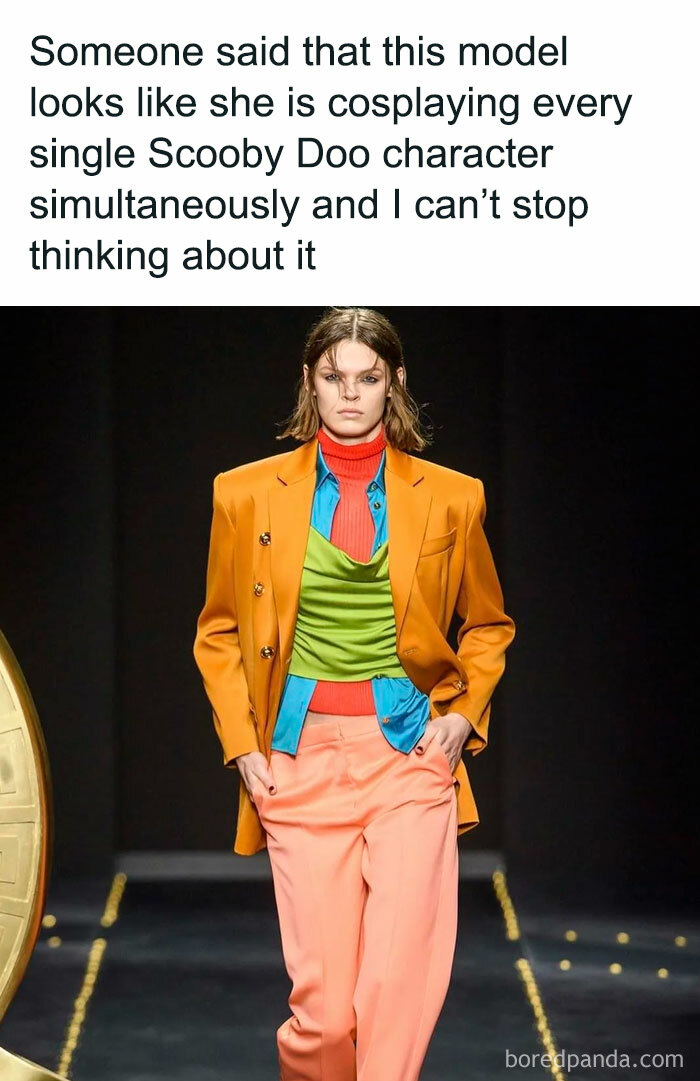 Model in a colorful outfit resembling a mix of Scooby-Doo characters, described as a "final boss" moment in real life.