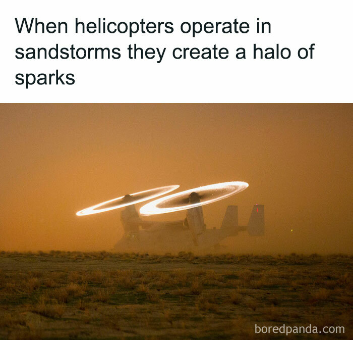 Helicopter creates halo of sparks in a sandstorm, appearing as a real life final boss moment.