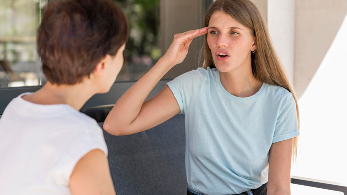 Two women in a heated discussion outdoors, focusing on relationship disagreements and conflicts.