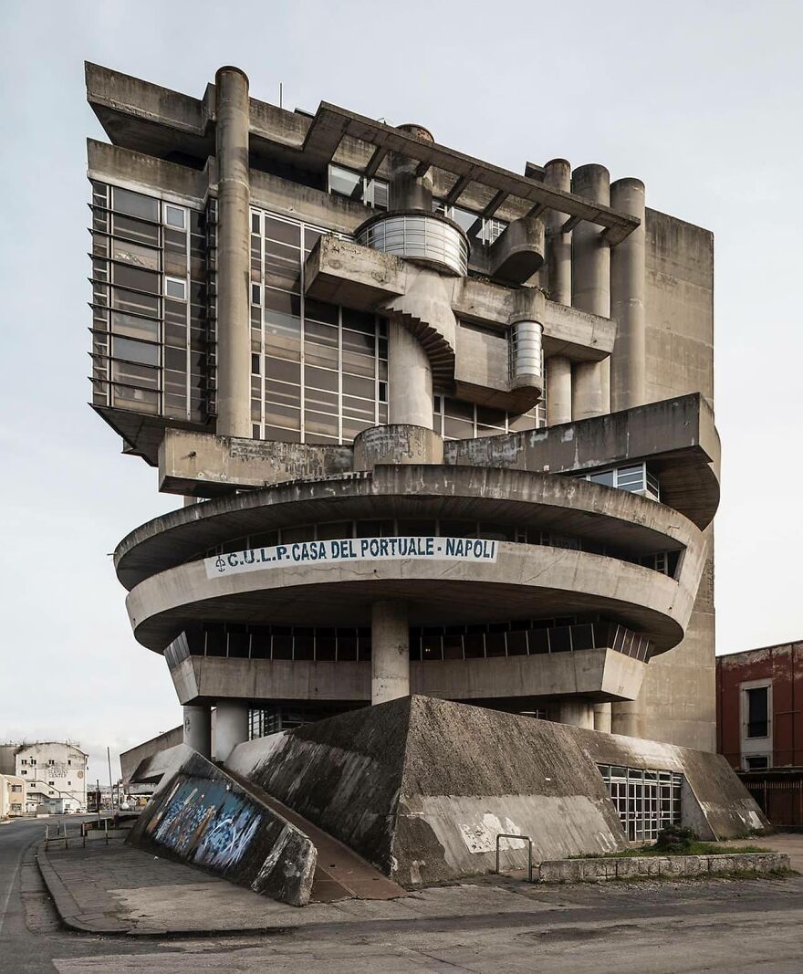 Brutalist architecture building with unconventional concrete design in Naples, Italy.