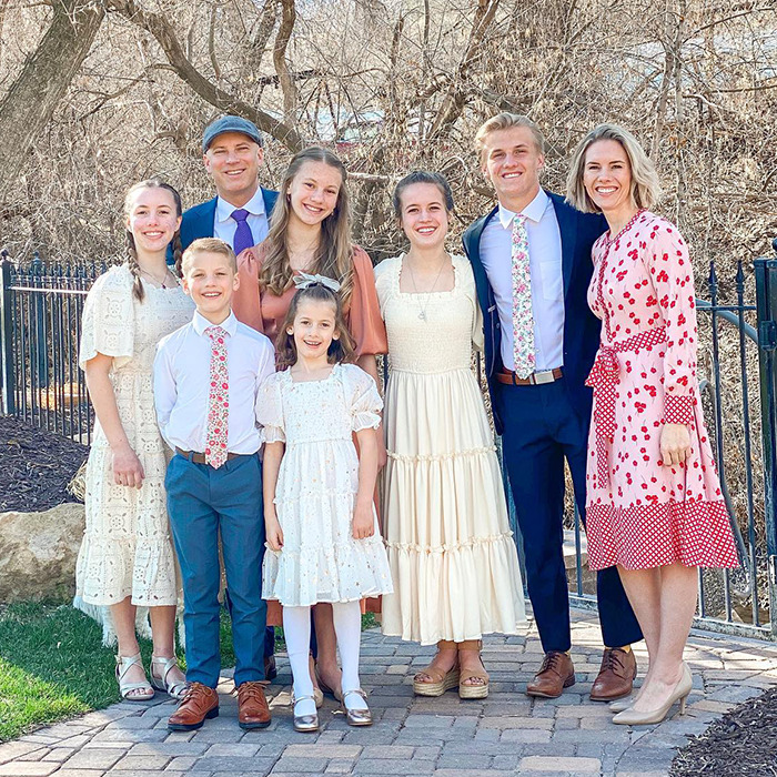 Family group posing outdoors, related to momfluencer abuser docuseries.