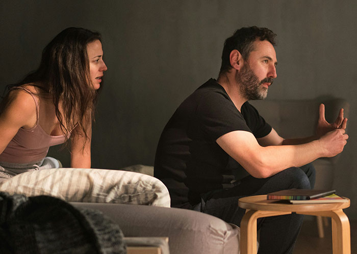 Man and woman in a tense conversation, related to a student making a creepy comment.