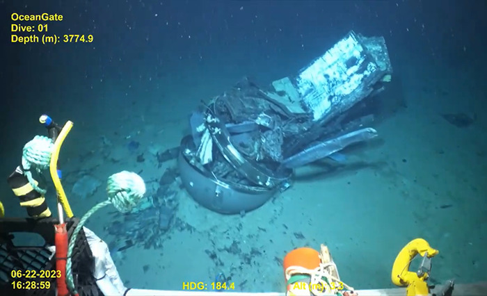 Debris of Titan sub at ocean floor, highlighting its eerie last moments, captured in deep-sea exploration dive.