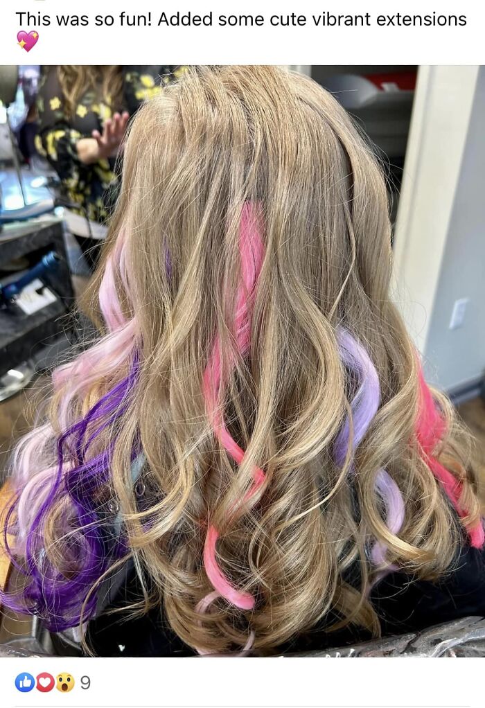 Blonde hair with vibrant pink and purple extensions, showcasing a hair fail with bold colors.