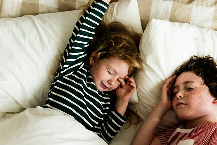 Girls at a sleepover, unaware of a hidden camera incident.