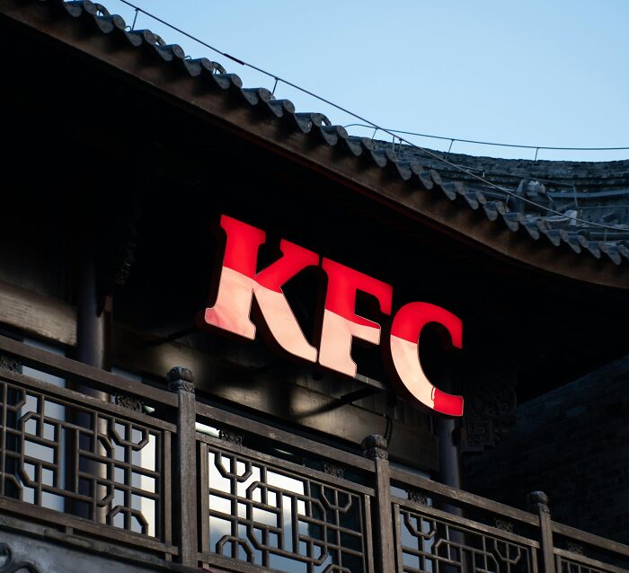 KFC restaurant exterior with neon logo, representing unique topics on Wikipedia articles to explore.