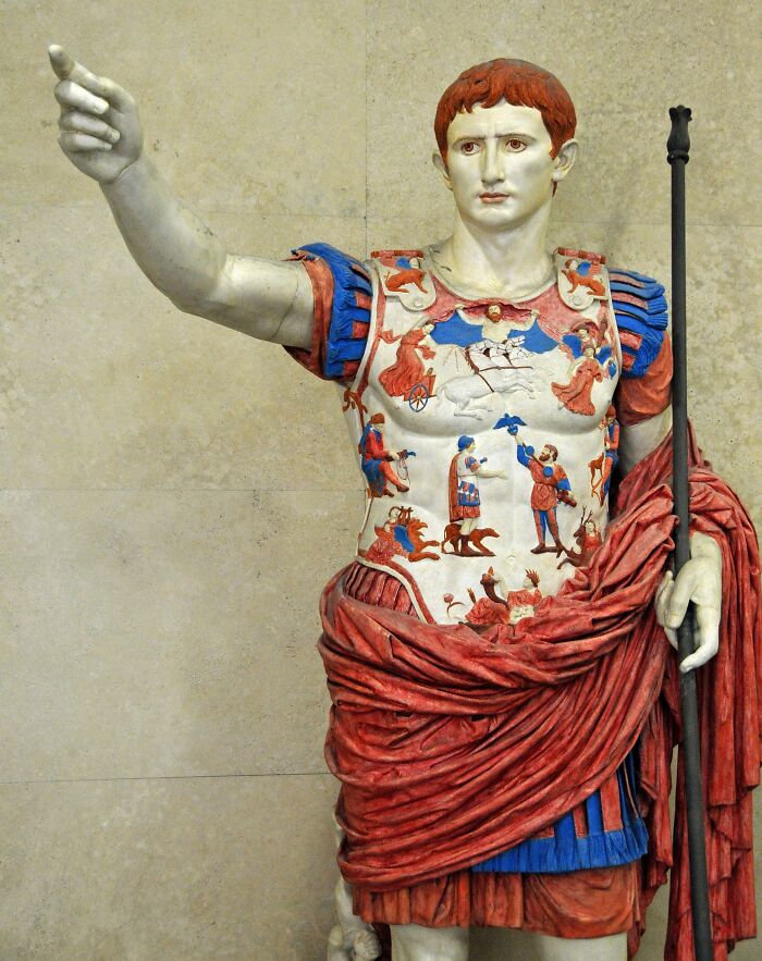 Colorful Roman statue of Augustus with detailed armor, an example of cool Wikipedia articles worth exploring.