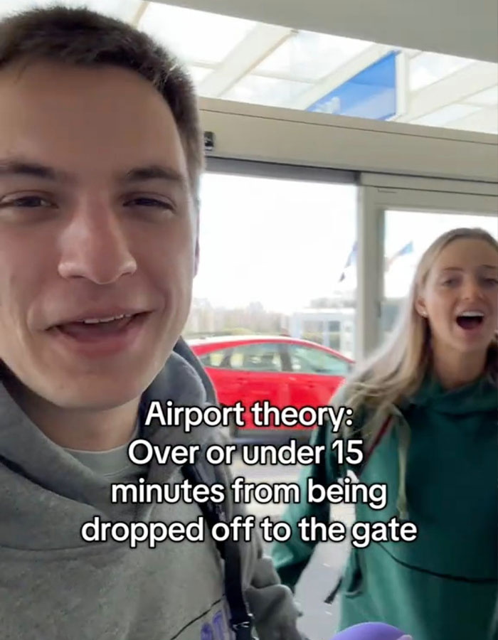 Two people at an airport discussing the viral &ldquo;Airport Theory&rdquo; trend displayed in text on-screen.