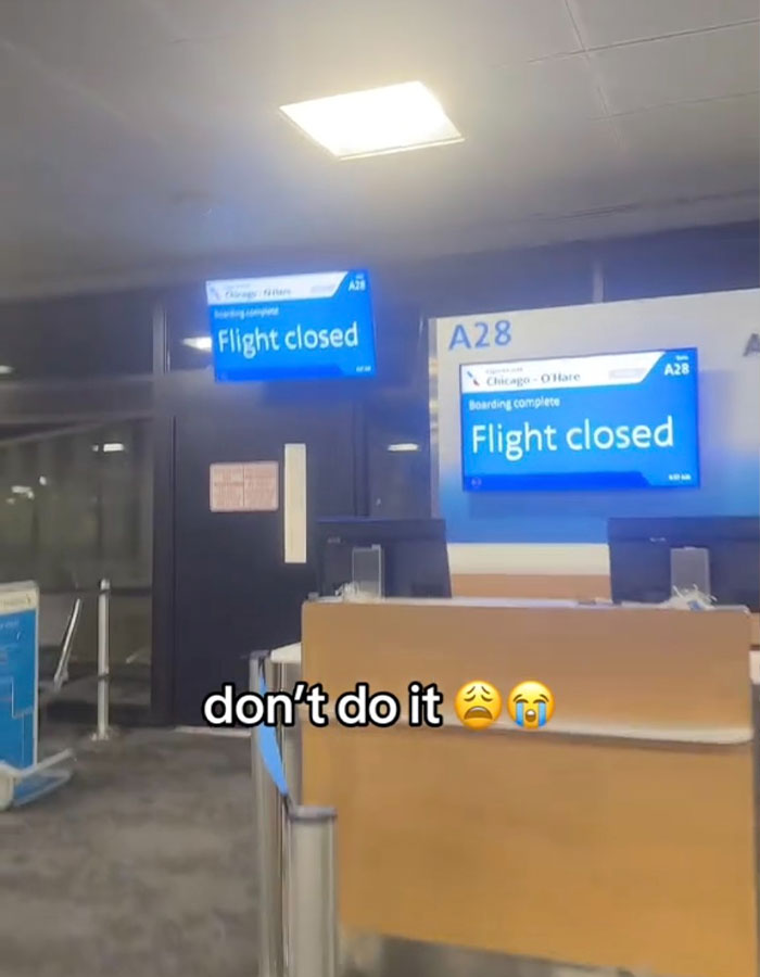 Flight gate with &ldquo;Flight closed&rdquo; sign, illustrating viral airport theory trend causing passengers to miss flights.