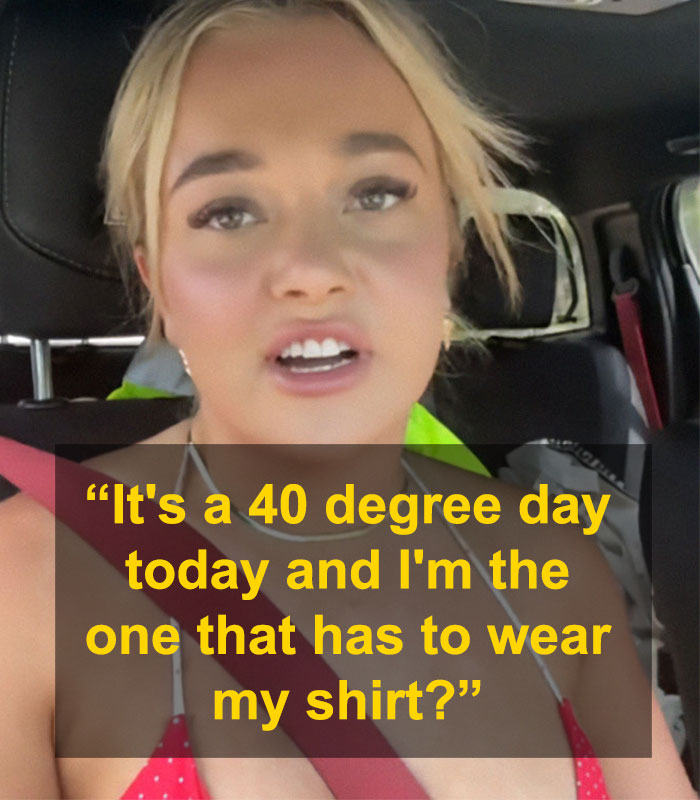 Woman in car advocating for her right to work topless like male co-workers, highlighting temperature disparity.