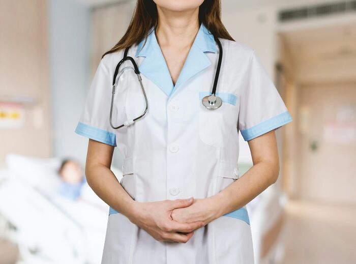 Healthcare professional in uniform with a stethoscope, representing valuable memberships in medical fields.