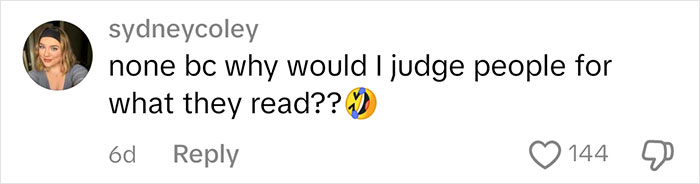 Comment dismissing book judgments with laughing emoji, highlighting perspectives on judging people by their books.