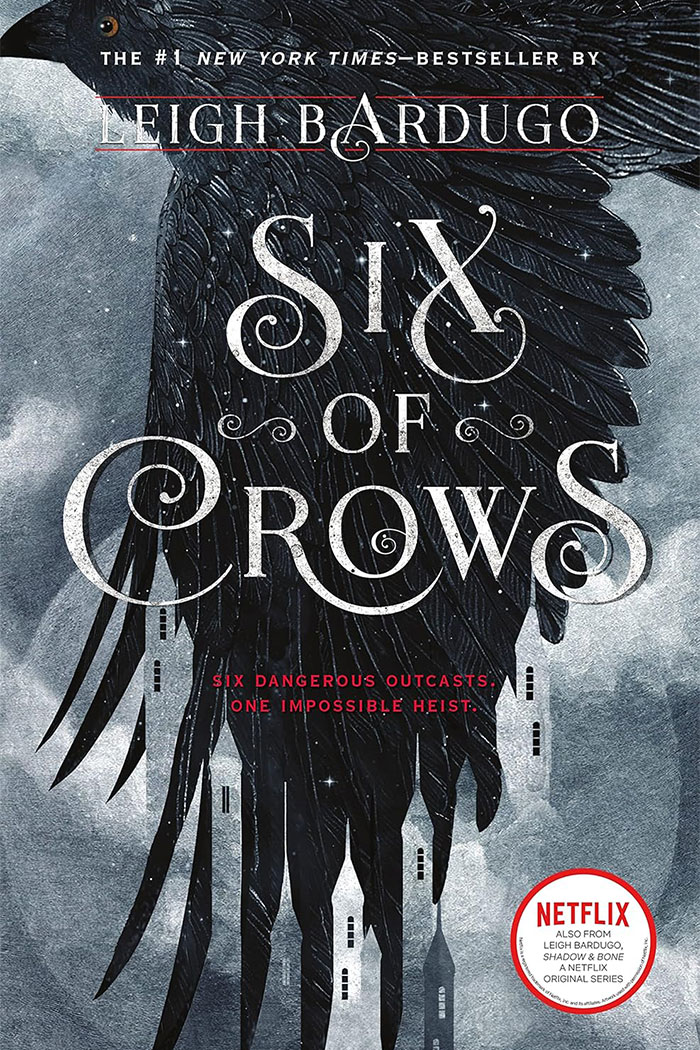 Cover of 'Six of Crows' by Leigh Bardugo, featuring a crow with wings extended.