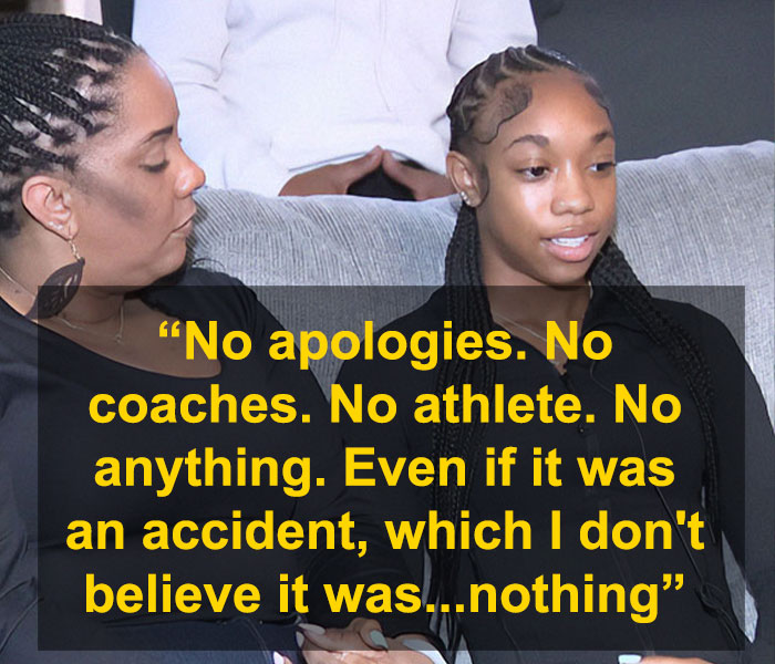 Track star discussing baton incident, claiming accident while seated on a couch, with a quote overlay in yellow text.