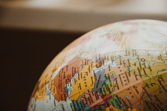 Close-up of a globe showing geography details, highlighting countries and borders.