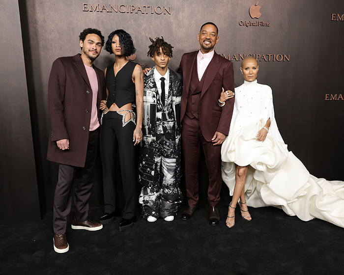 A group of people in formal attire at the &ldquo;Emancipation&rdquo; premiere event.